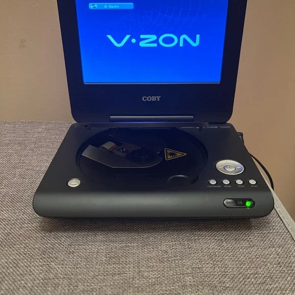 Coby V-zon portable DVD. Like new in great condition 7”